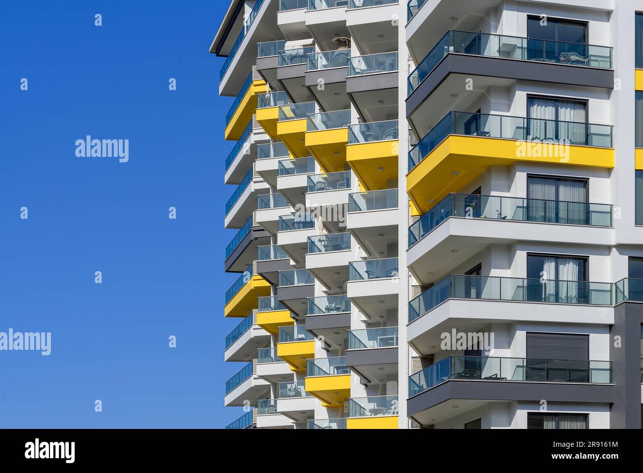 Modern apartment building with luxurious balconies. Clear sky Stock ... - Luxury Apartment Building Private Balconies Views