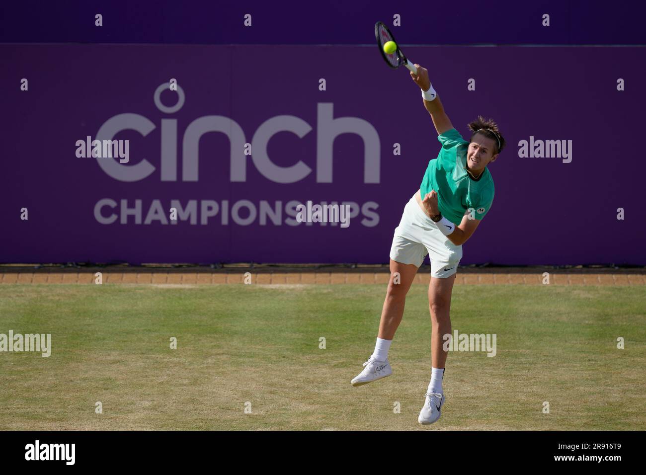 Sebastian Korda of the USA serves to Cameron Norrie of Britain during