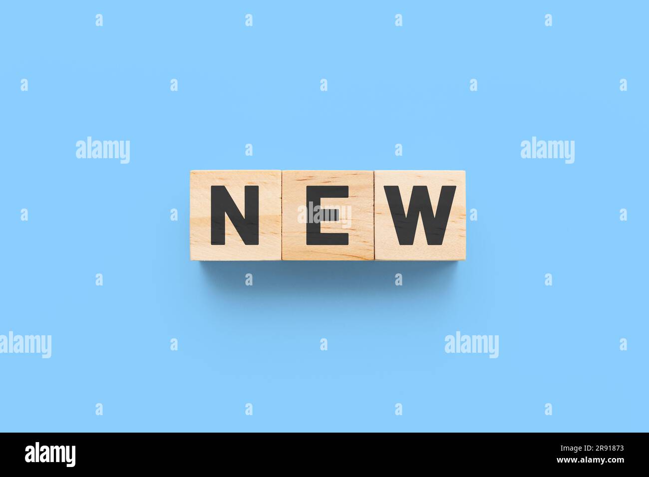 New wooden cubes on blue background Stock Photo - Alamy