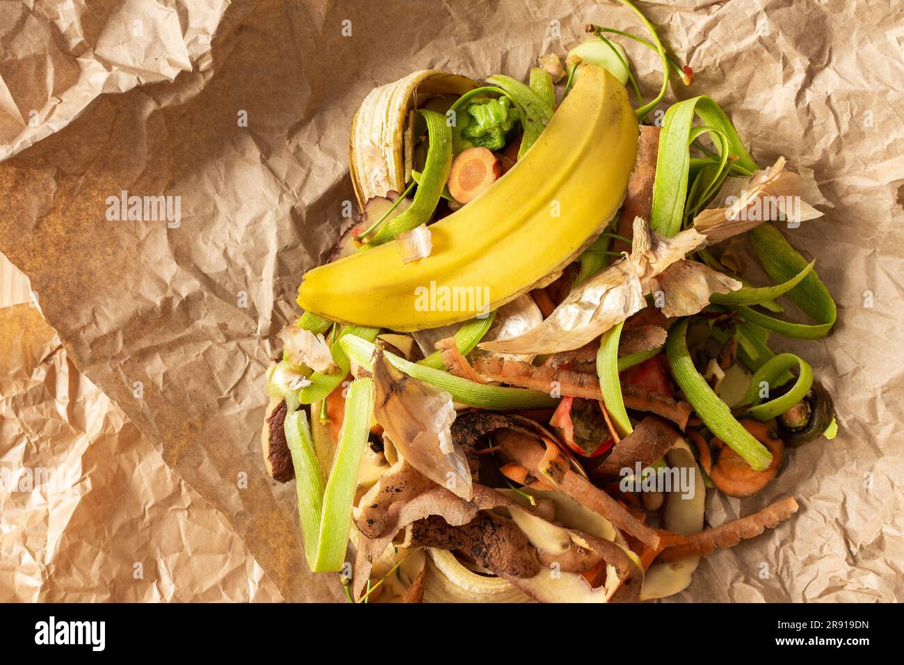 Food organic waste on eco friendly parchment paper, fruit and vegetable