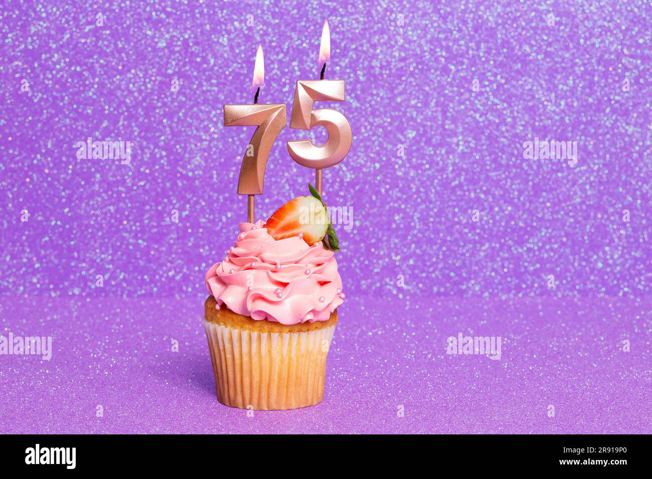 Cupcake With Number For Celebration Of Birthday Or Anniversary; Number 75 Stock Photo