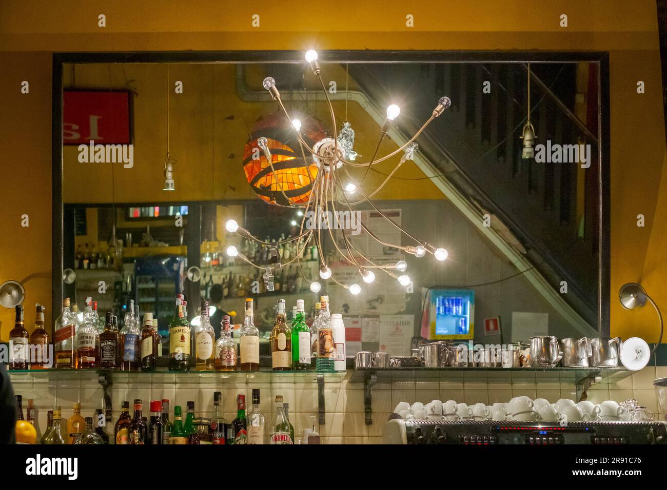 The mirror of the bar in the center of Bologna, Emilia-Romagna, Italy. Stock Photo