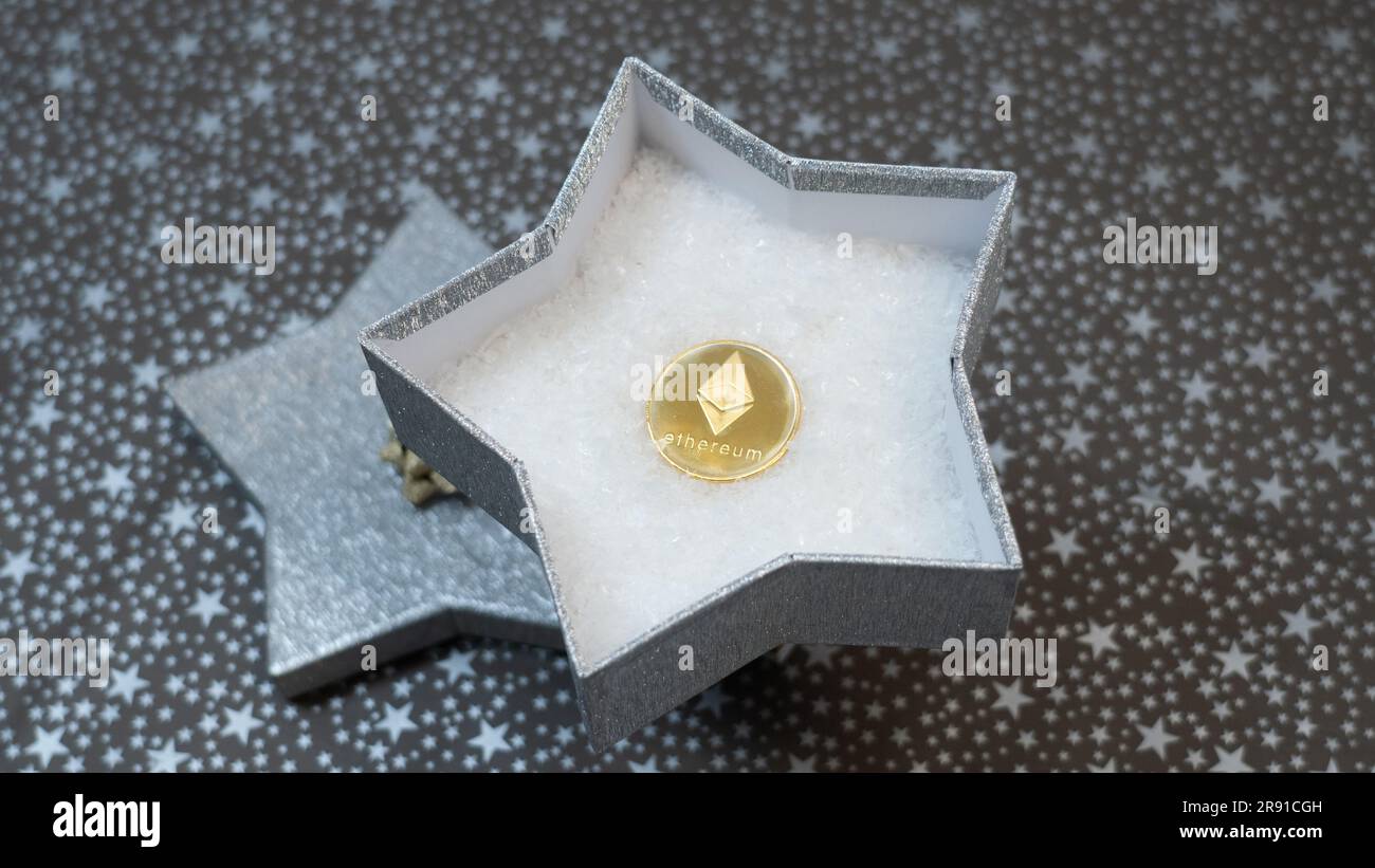 Way to give crypto as a gift. Giving Ethereum (Ether) ETH as a gift. A  monetary gift in a silver shiny star box, stars pattern, golden bow Stock  Photo - Alamy