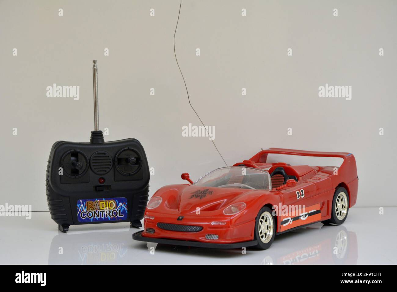 Remote controlled car radio controlled with joystick studio shot. Brazil. side view Stock Photo