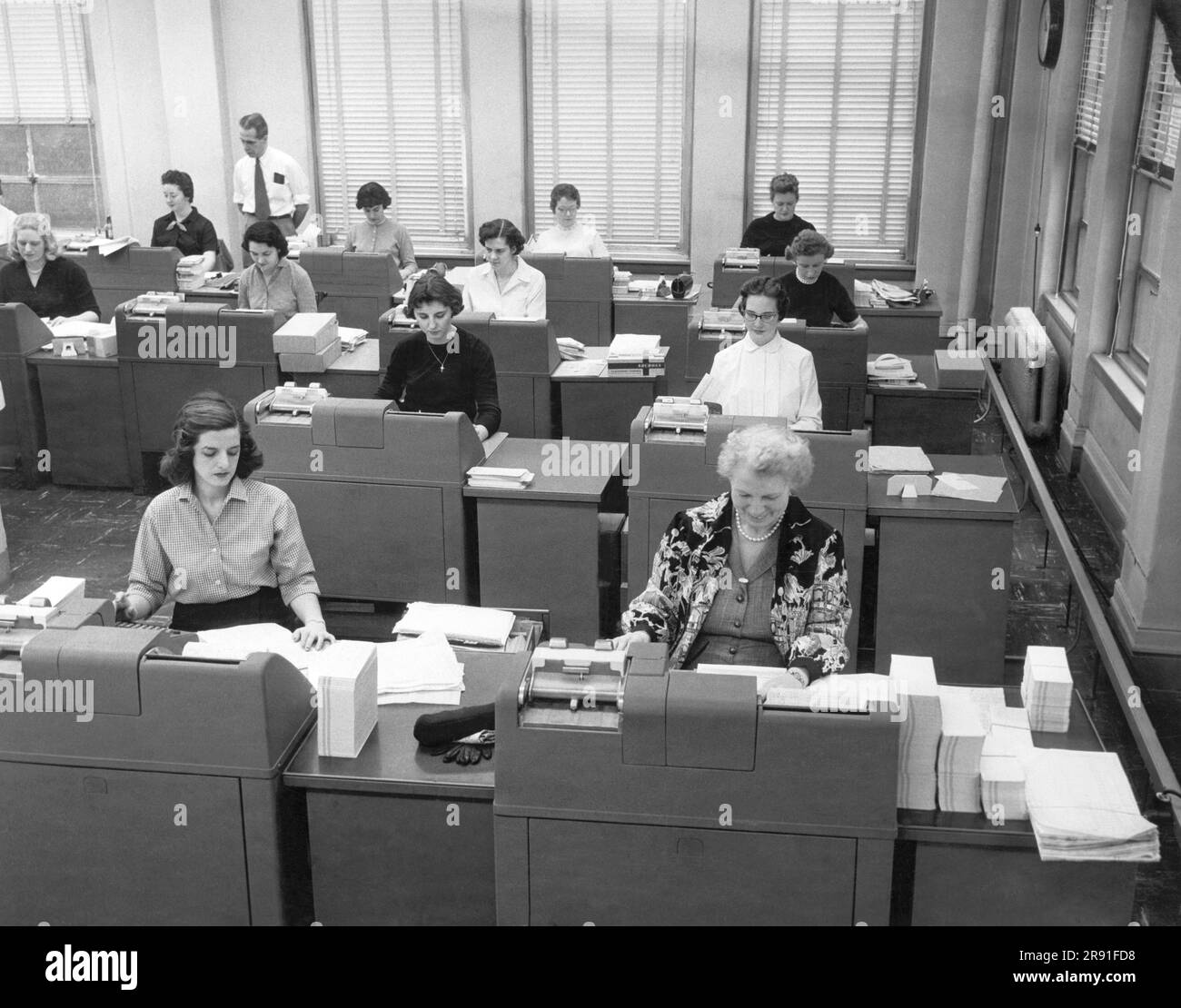 Cleveland, Ohio: January 22, 1958 Women office workers entering data ...