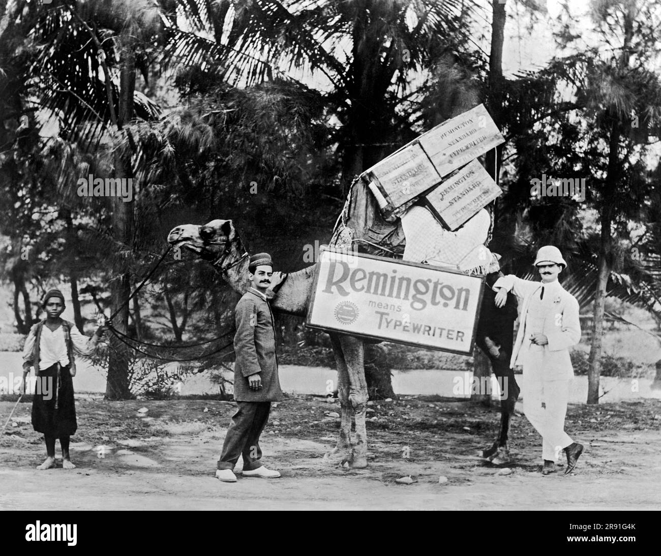 Baluchistan, Pakistan.  1913 American typewriter salesman traveling by camel. Stock Photo