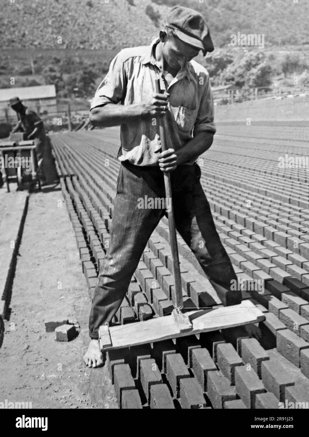 Haverstraw, New York July 29, 1924. A worker in a Hudson River