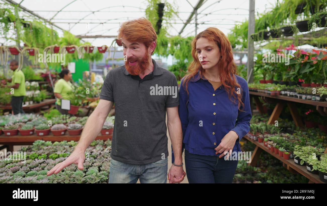 Exploring Flower Shop Redhead Couple Seeking Decorative Plants in ...