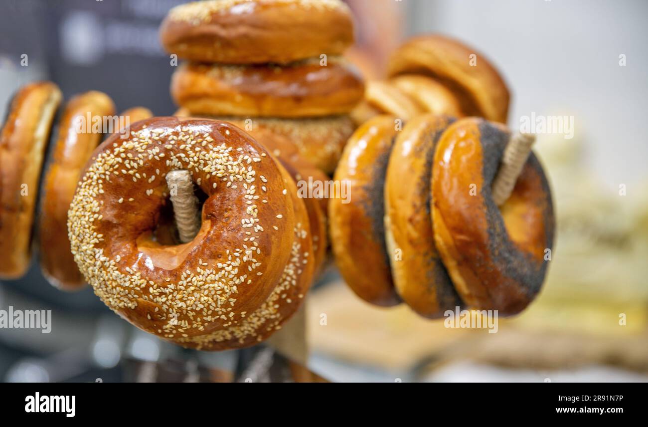 Freshly baked bagels with sesame seeds and poppy seeds closeup Stock Photo