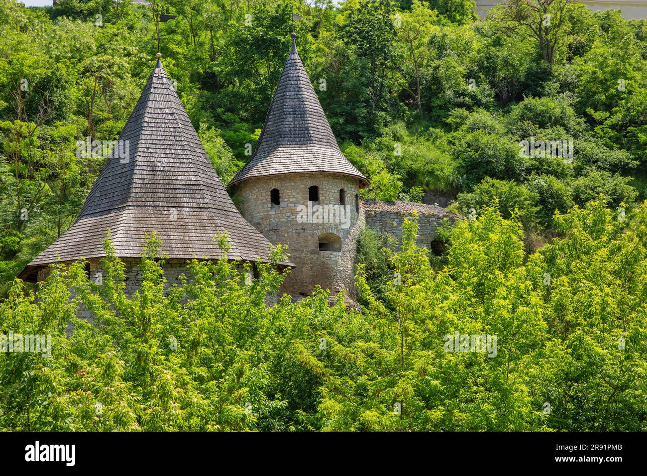 Old stone medieval Polish Gate. It is part of the city's old fortification complex of the castle in Kamianets-Podilskyi, Ukraine. Stock Photo