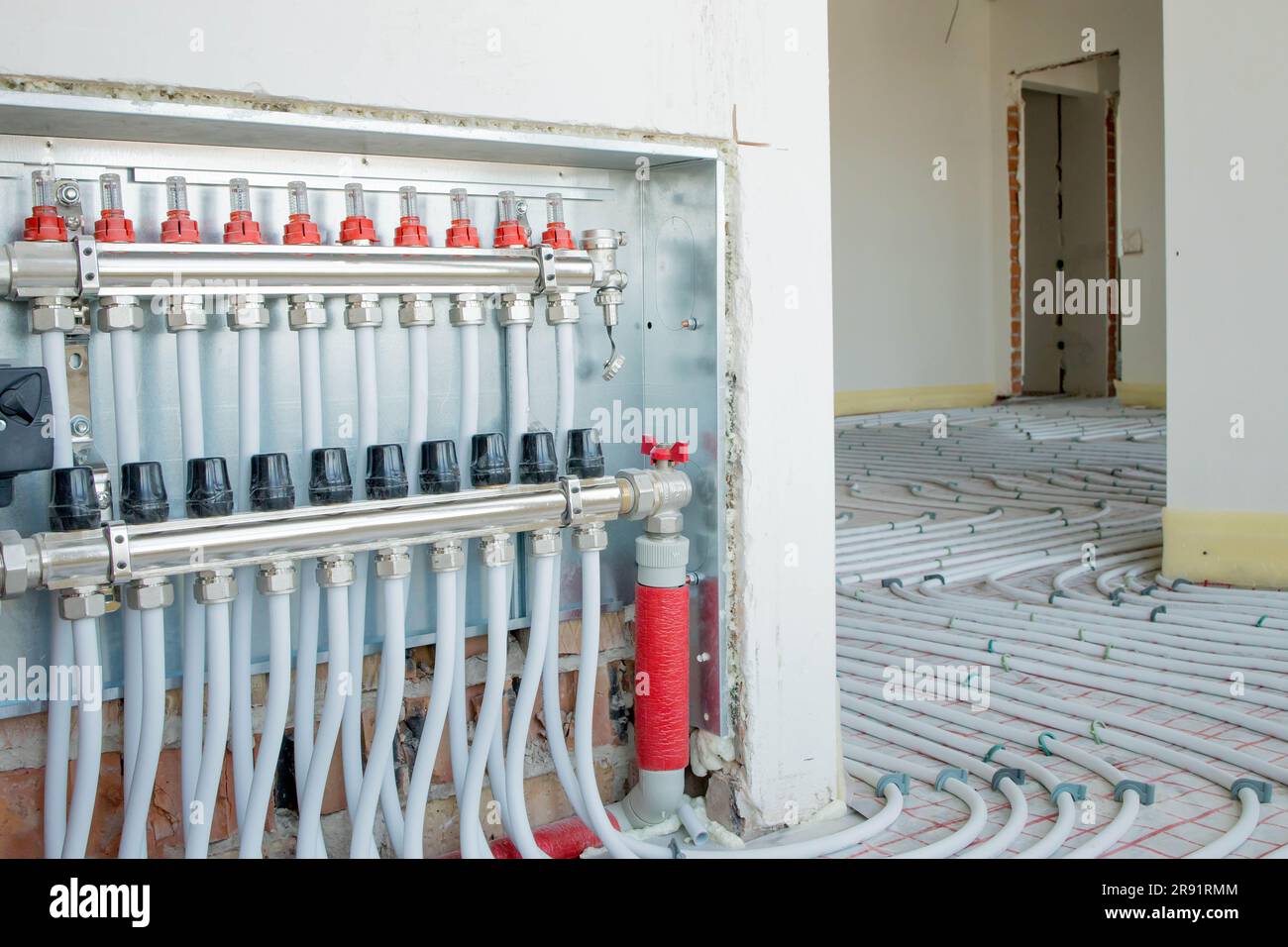 Install system Manifold Assembly of underfloor heating at home Stock