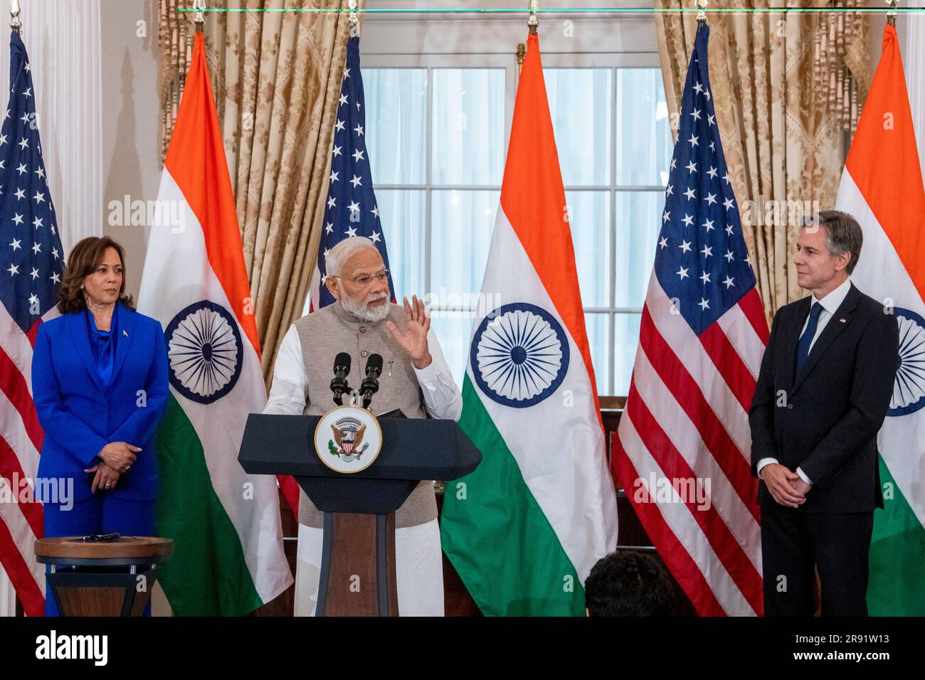 United States Vice President Kamala Harris, left, and United States Secretary of State Antony Blinken, right, listen while Prime Minister Narendra Modi of the Republic of India, center, offers remarks during a luncheon at the U.S. Department of State in Washington, DC, Friday, June 23, 2023. Credit: Rod Lamkey/Pool via CNP Stock Photo
