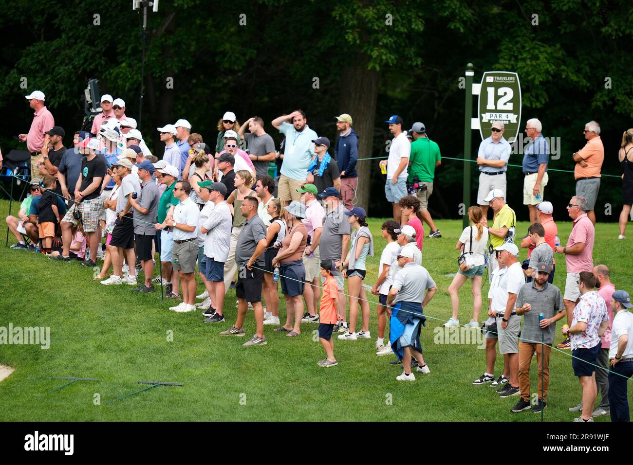 Fans watch play on the 11th green during the second round of the Travelers Championship golf tournament at TPC River Highlands, Friday, June 23, 2023, in Cromwell, Conn