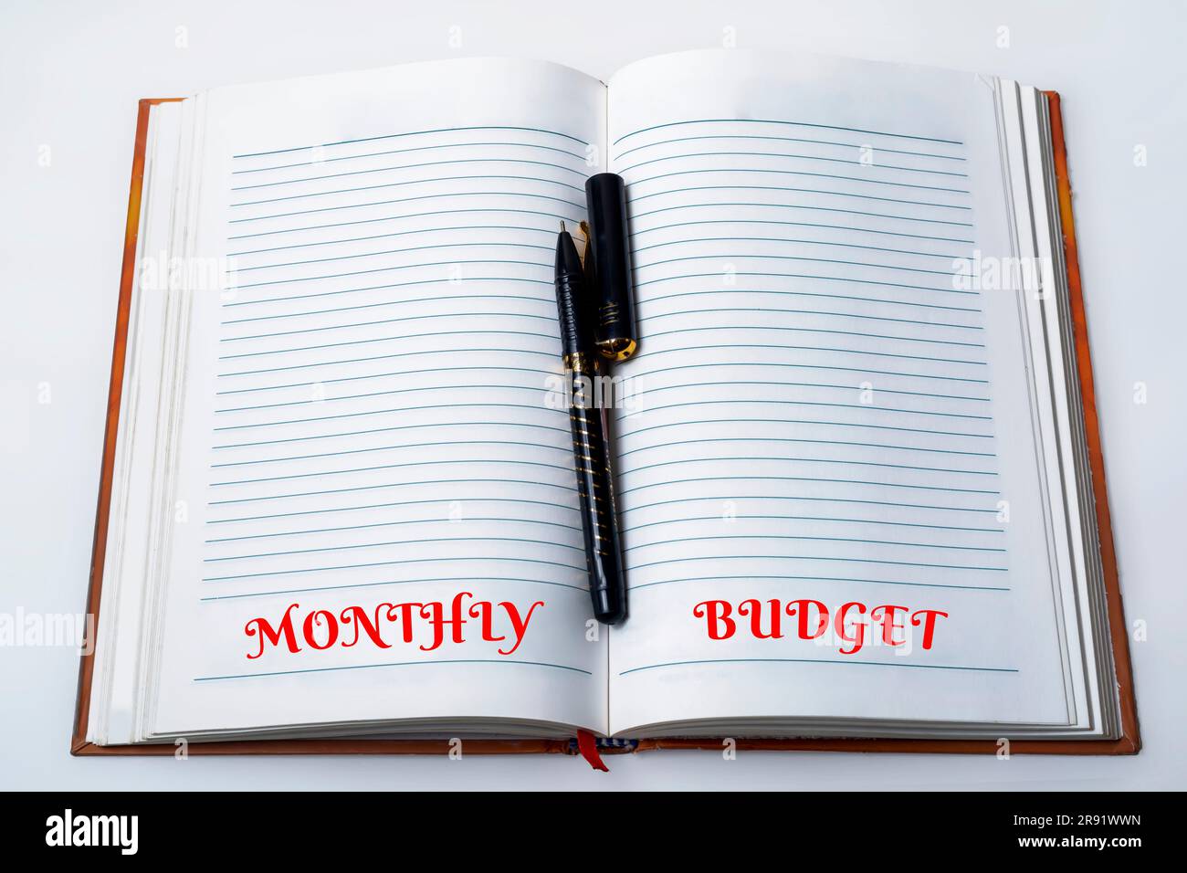 Business concept: handwriting in notebook on white background with space for text. Stock Photo