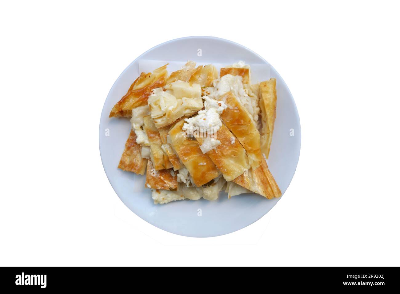 A close-up of a traditional Turkish borek on an isolated white background Stock Photo