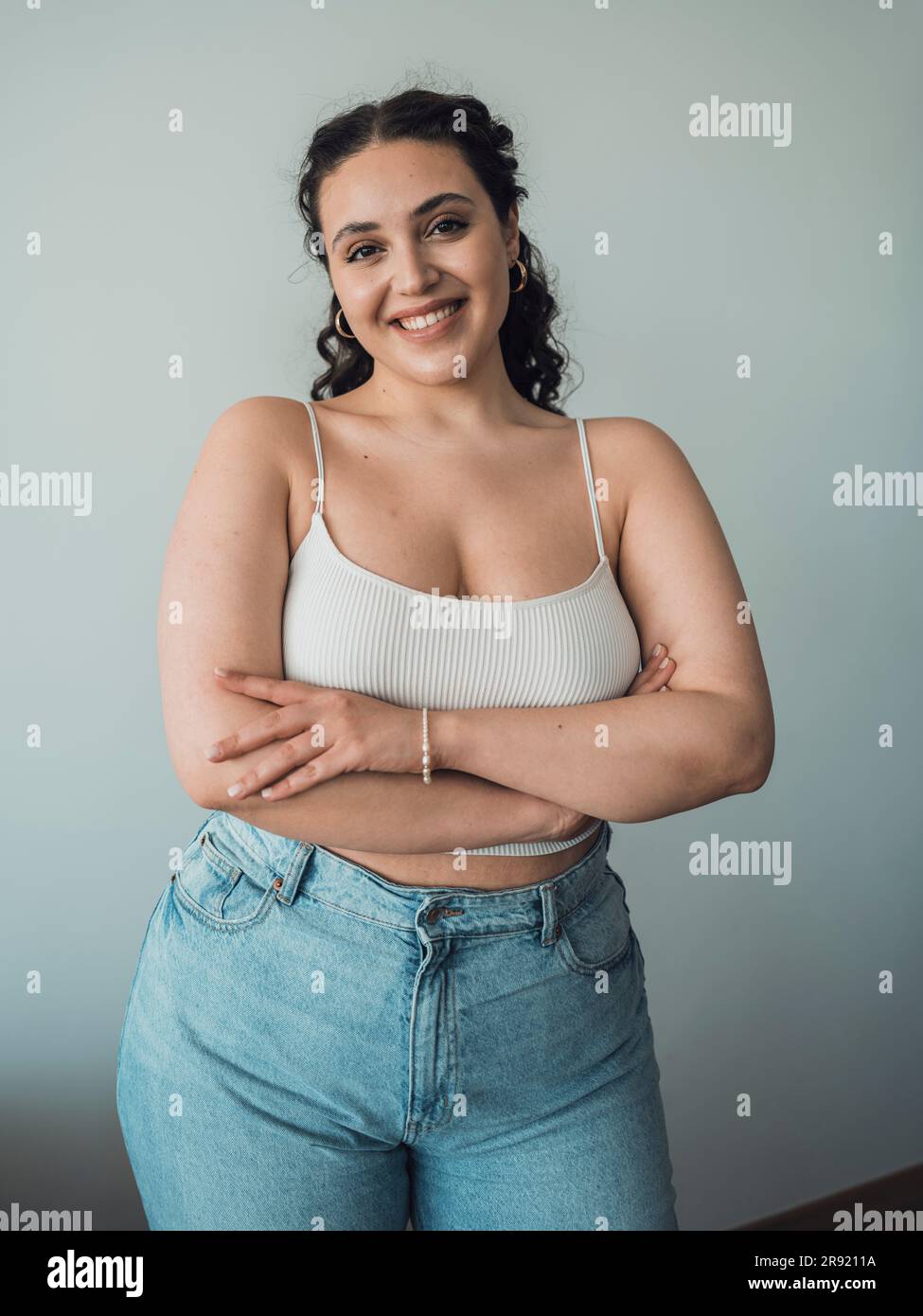 Arms crossed young woman my body hi-res stock photography and images ...