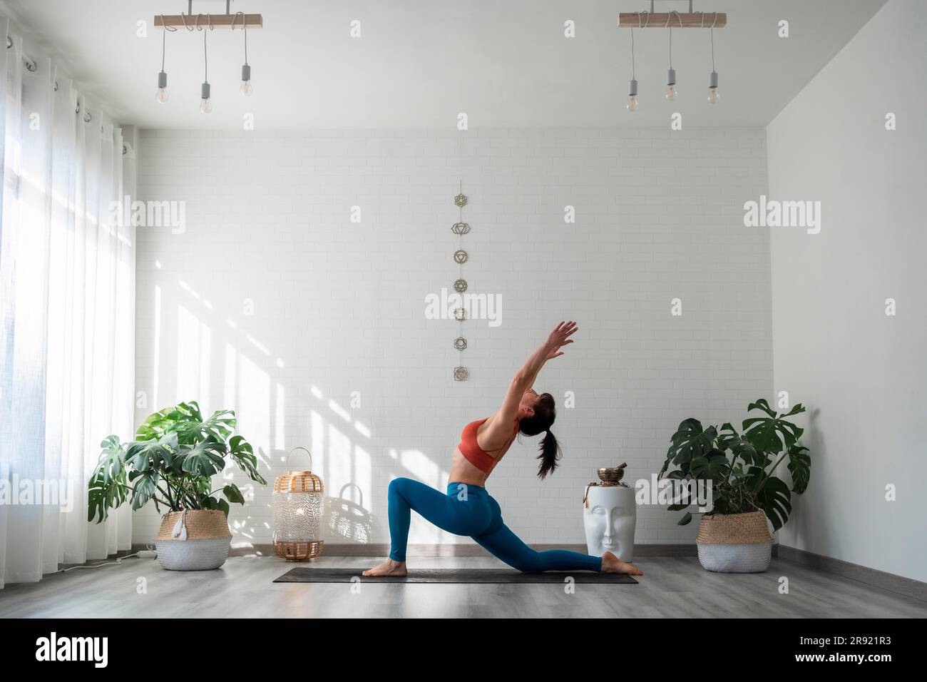 House stretching mature woman hi-res stock photography and images - Alamy