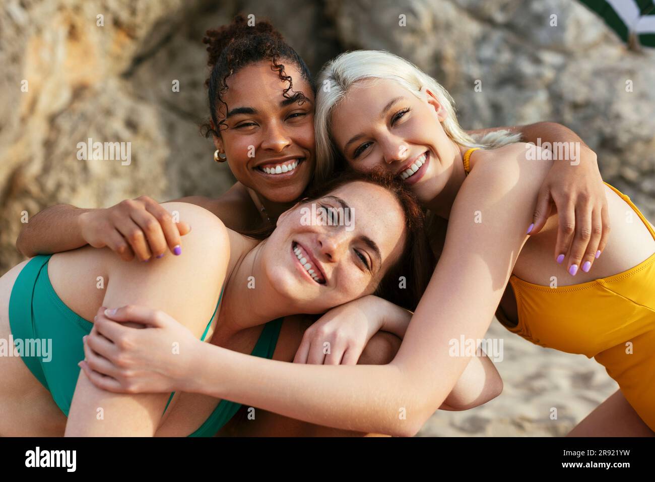 Curvy women on beach hi-res stock photography and images - Alamy