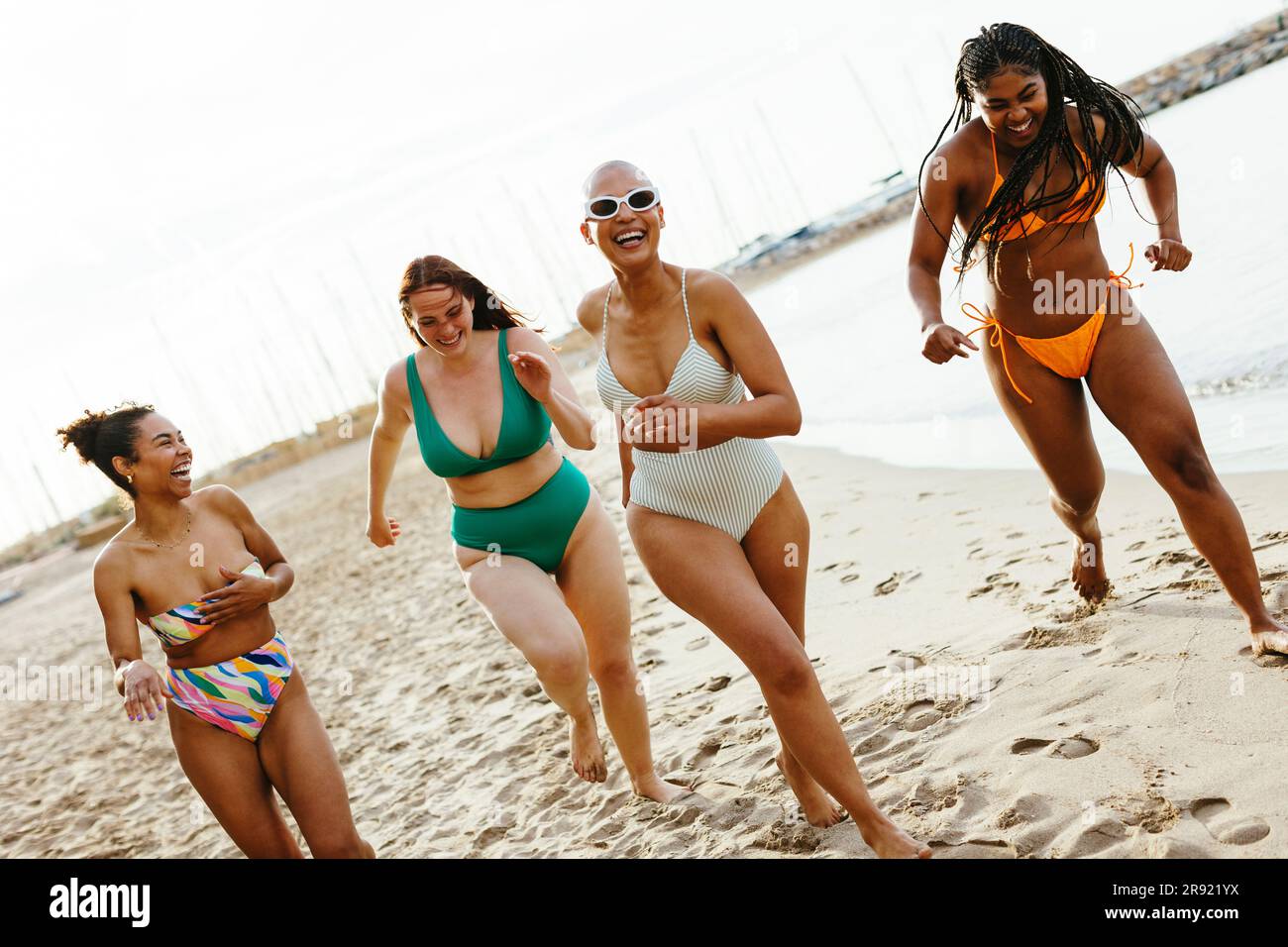 Women friends beach bikinis hi-res stock photography and images photo