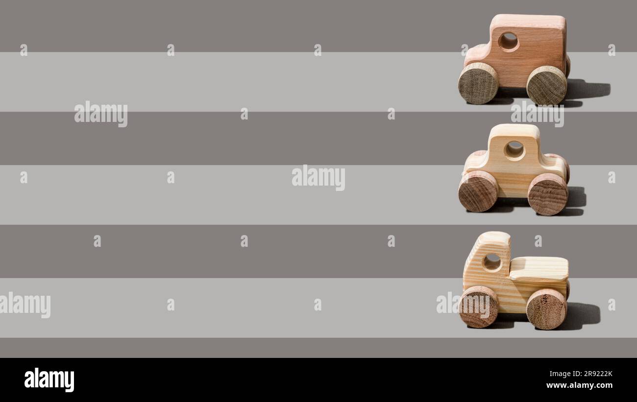 Wooden cars arranged in rows Stock Photo