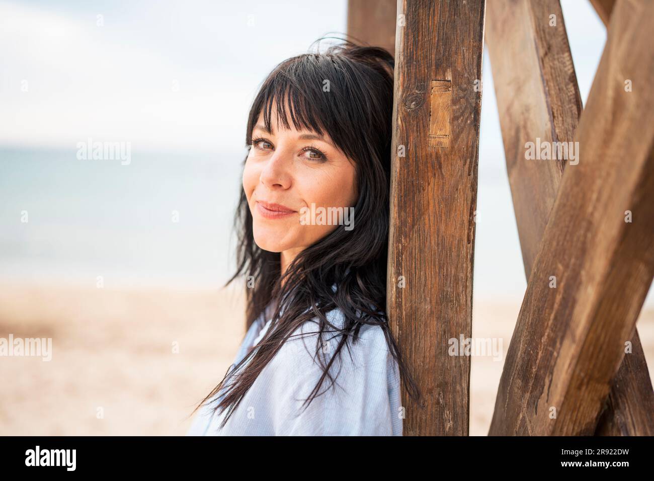Smiling mature woman long hair hi-res stock photography and images - Alamy