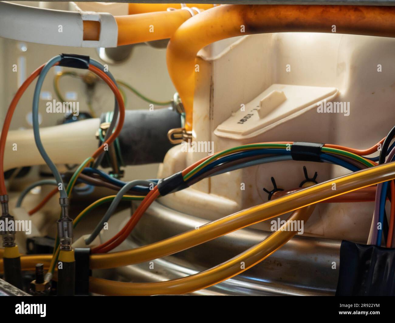 Dishwasher Details of the motor, pipes and electricity Stock Photo Alamy