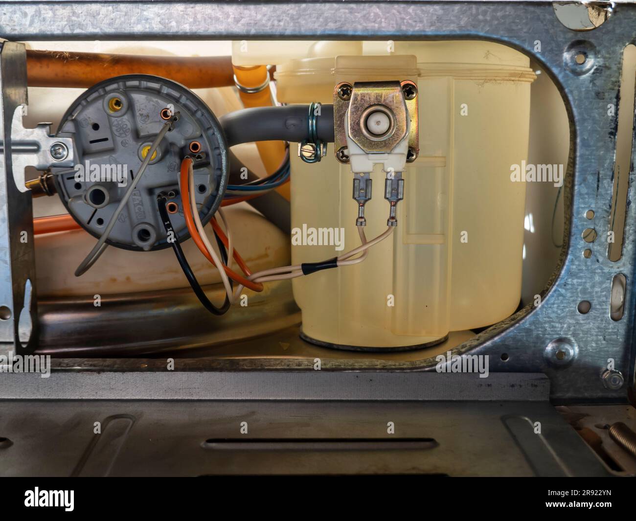 Dishwasher Details of the motor, pipes and electricity Stock Photo Alamy