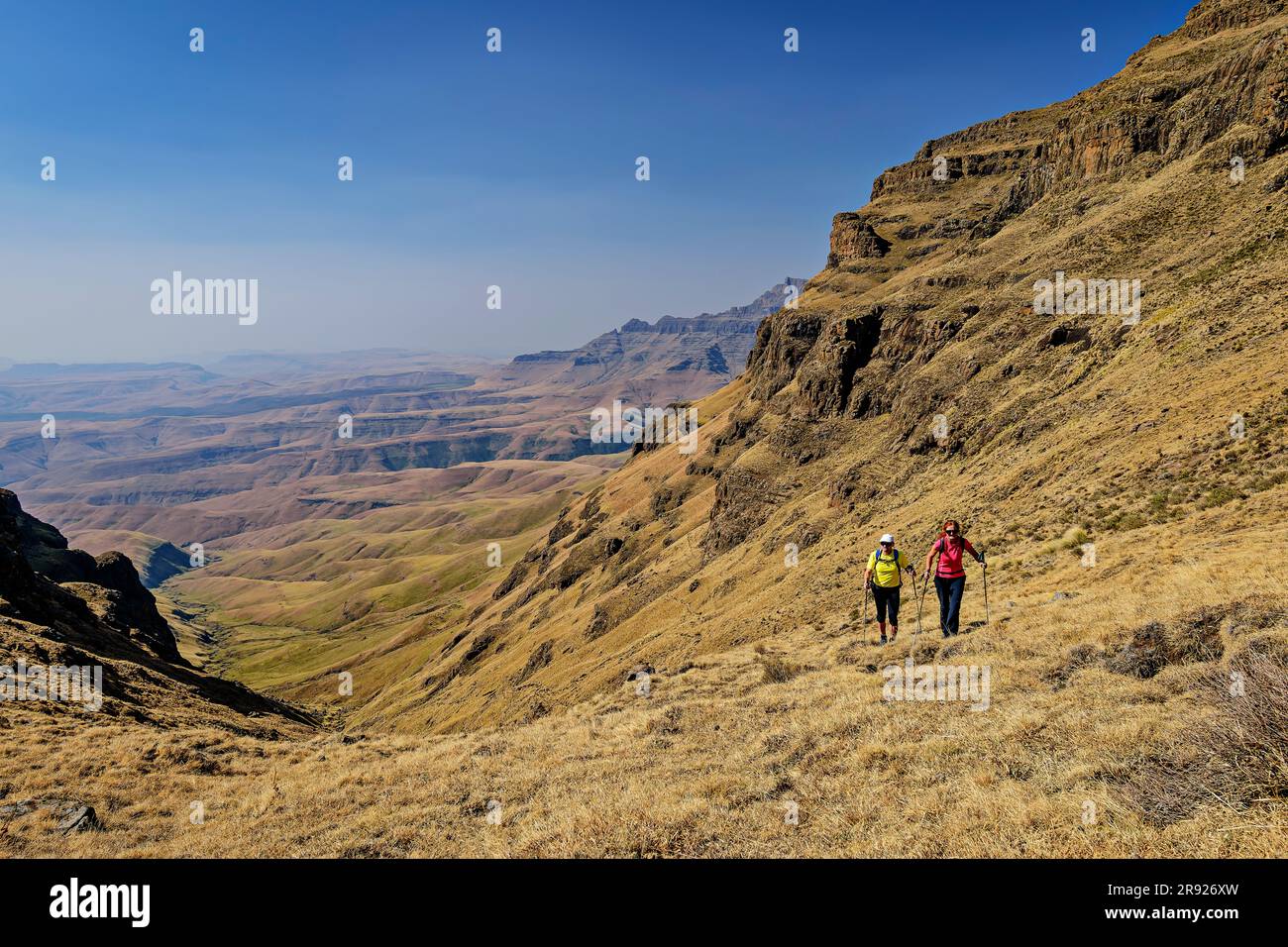 Mature woman and man hiking at KwaZulu-Natal, Drakensberg, South Africa Stock Photo
