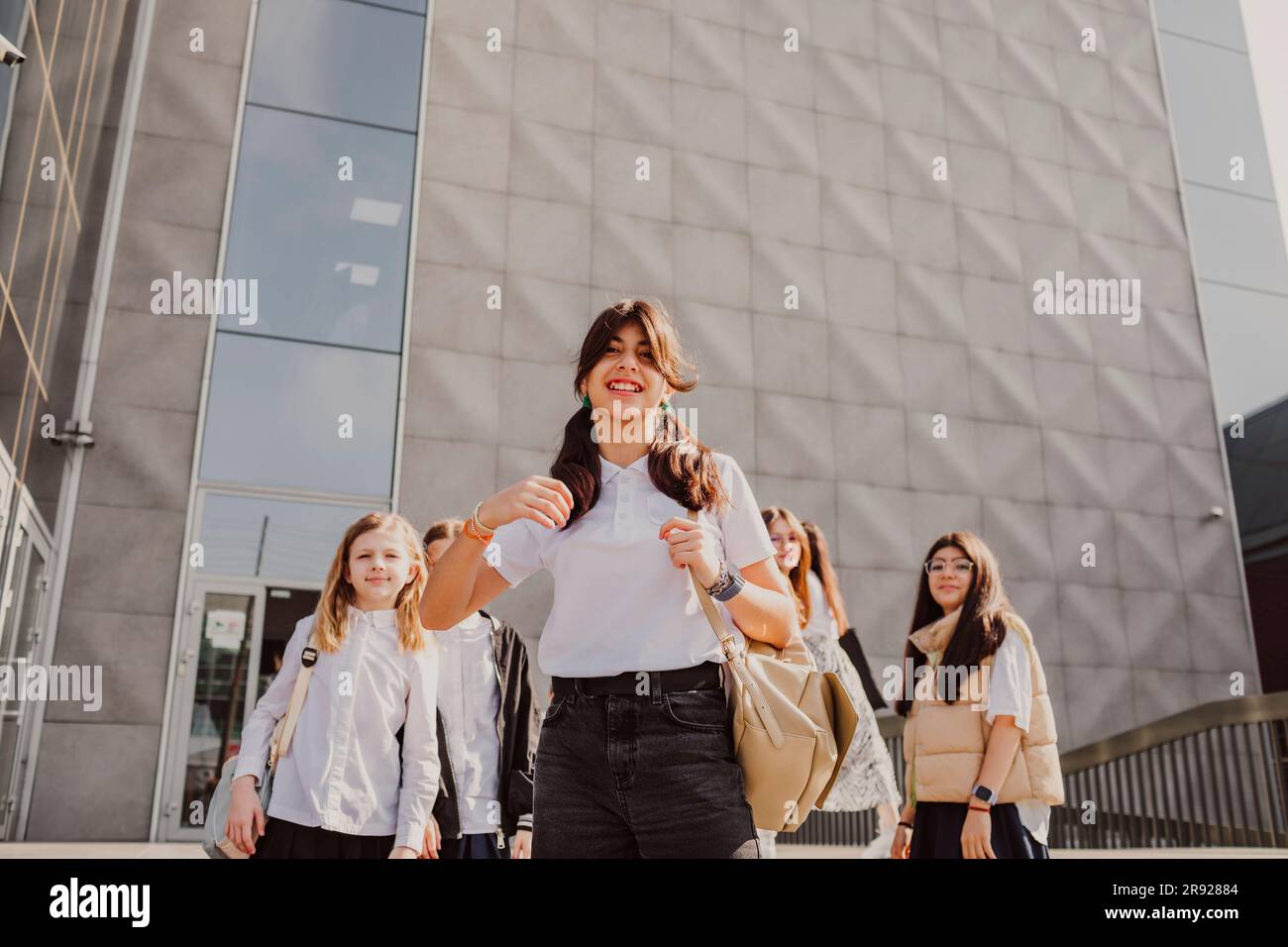 School girl smiling uniform hi-res stock photography and images - Alamy