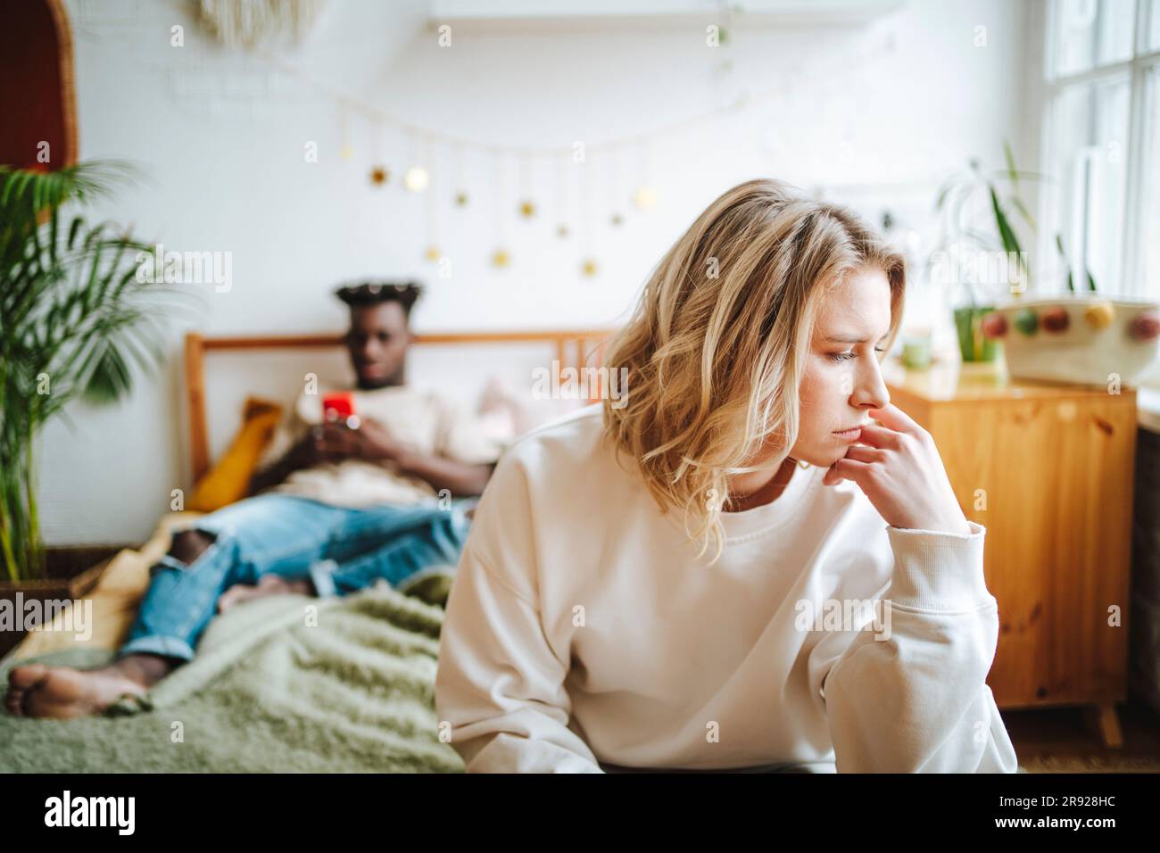Woman sad man background hi-res stock photography and images - Alamy