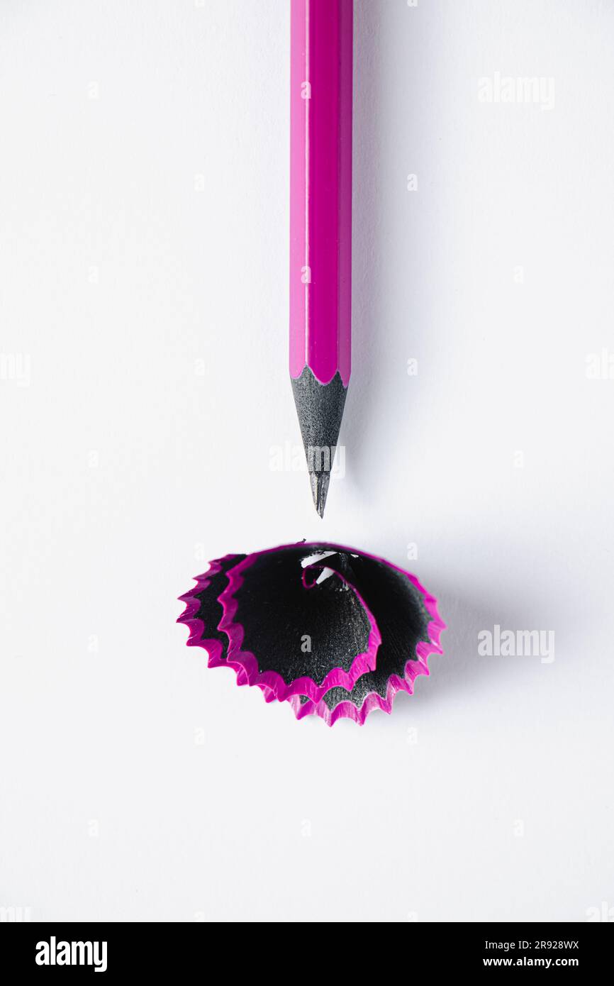 Sharpening graphic pencil for drawing. Wooden purple pencil and ...