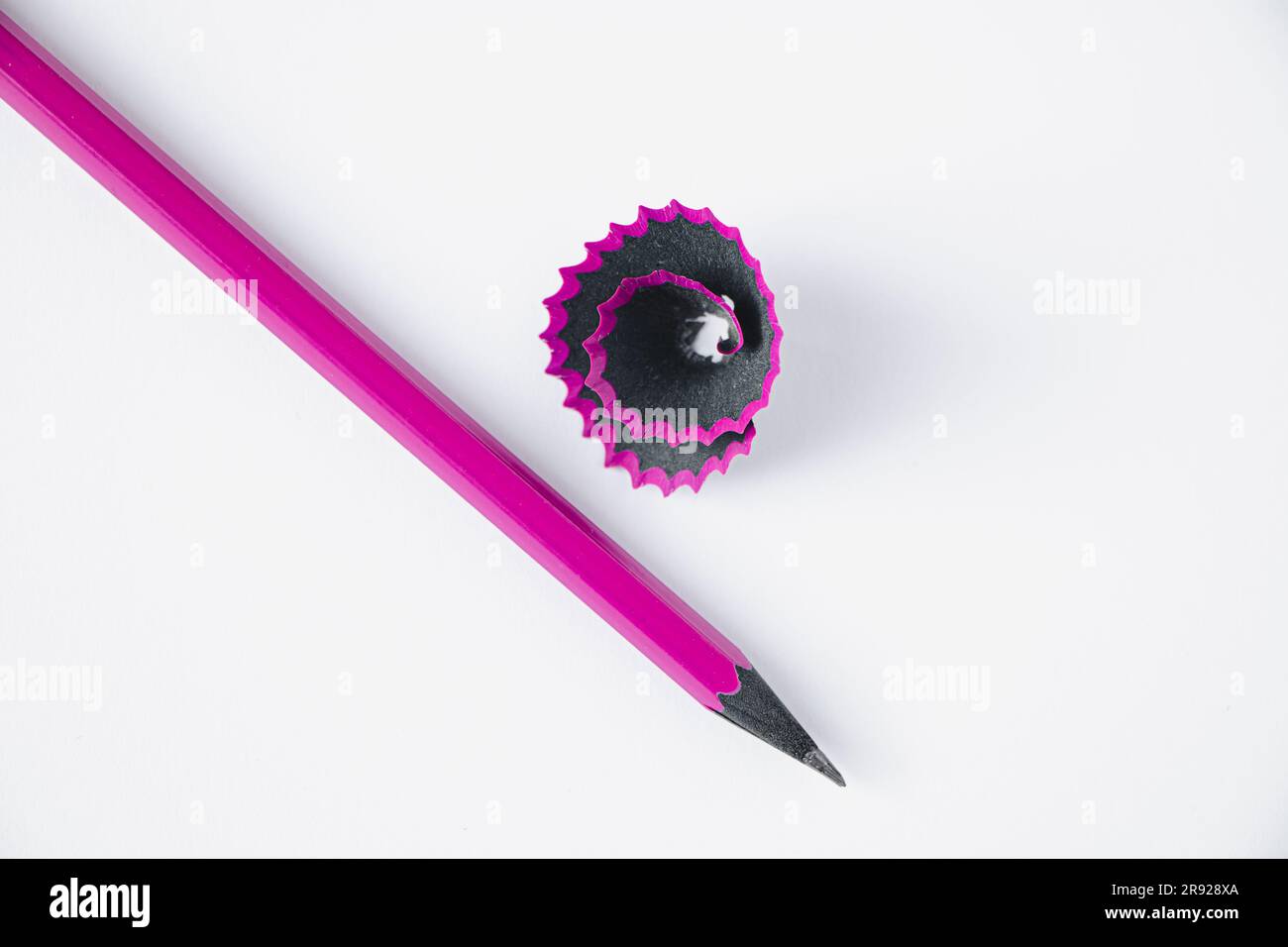 Sharpening graphic pencil for drawing. Wooden purple pencil and ...