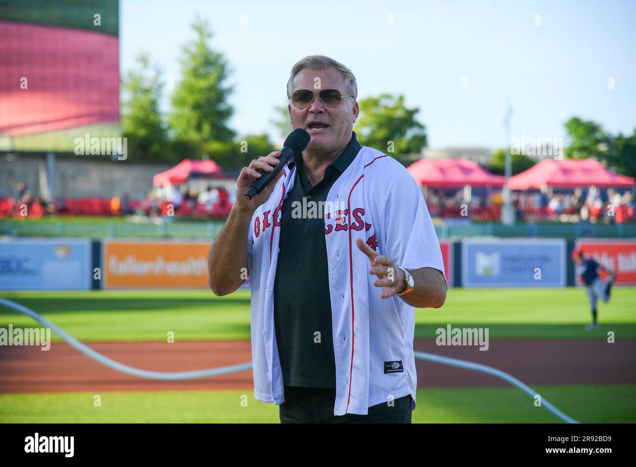 WORCESTER, MA - JUNE 22: Sports broadcaster and former NFL quarterback Scott  Zolak walks off the field after throwing out a ceremonial first pitch  before a AAA MiLB game between the Lehigh