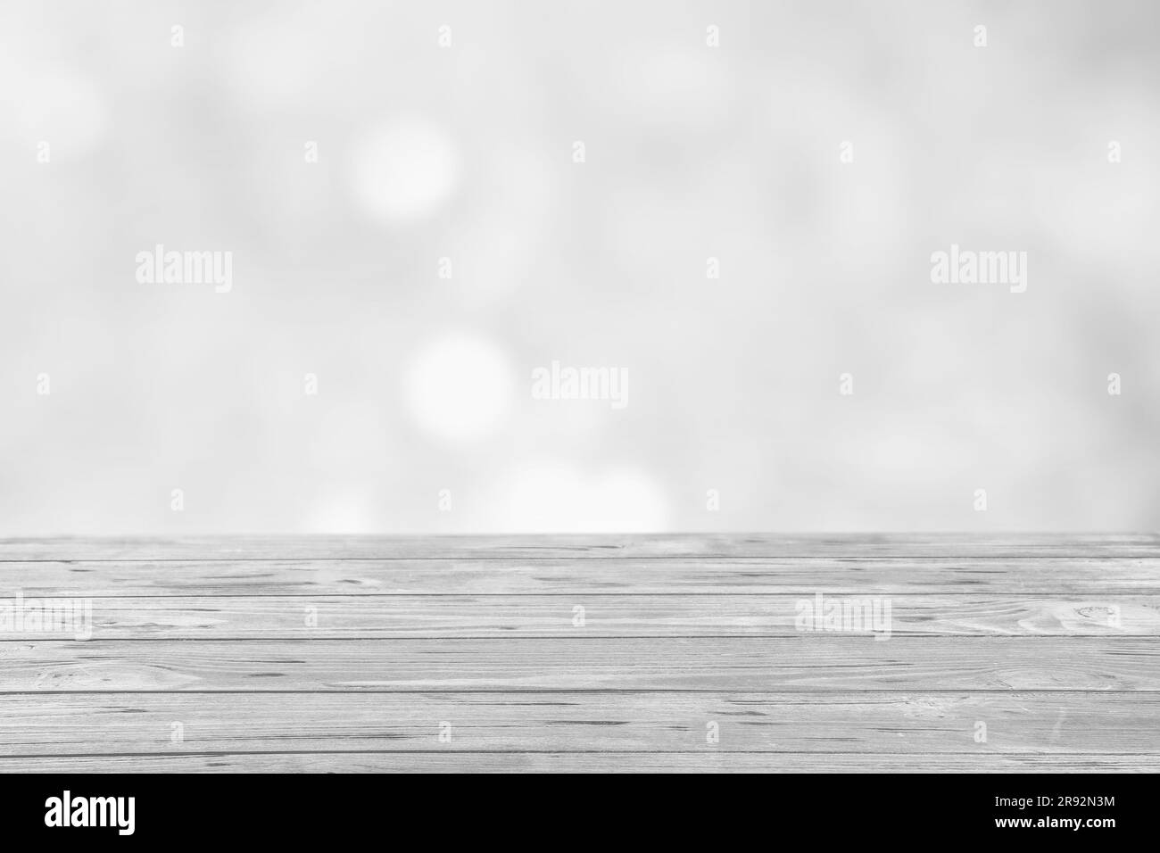 Empty white wooden surface against blurred background, bokeh effect. Space for design Stock Photo