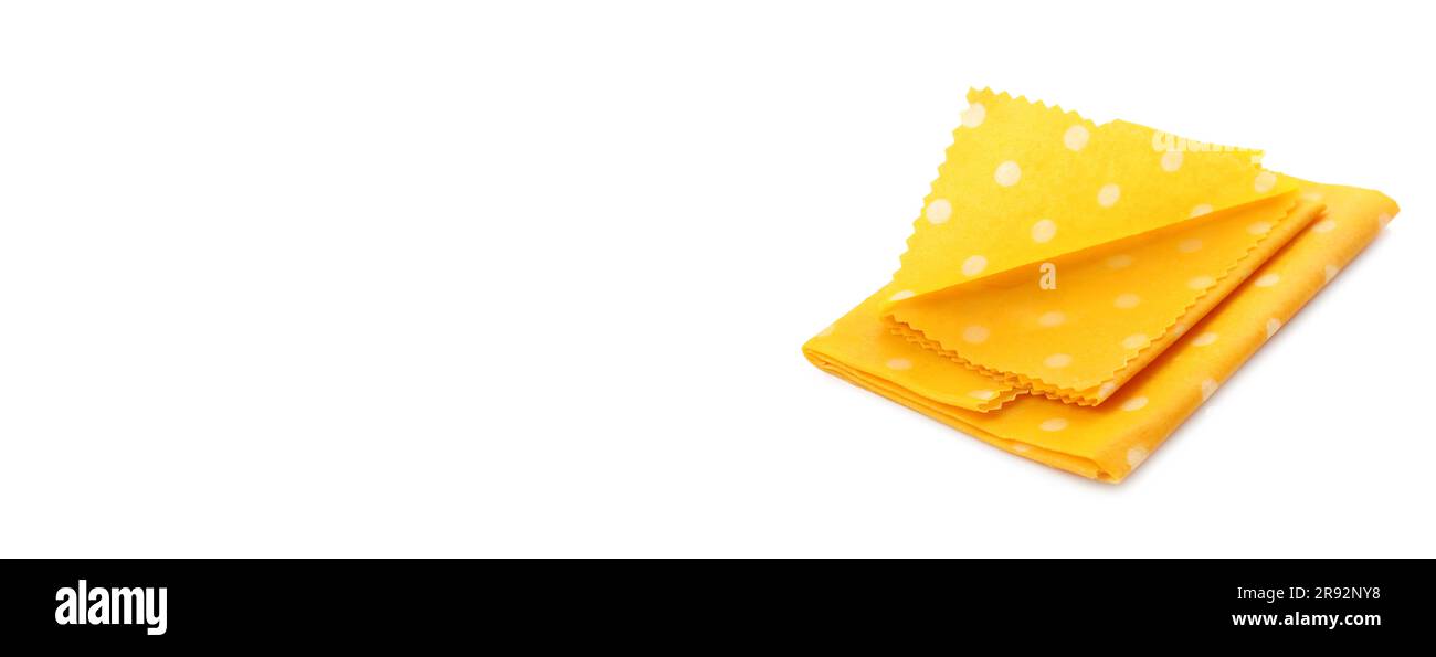 Yellow beeswax food wraps on white background, banner design Stock