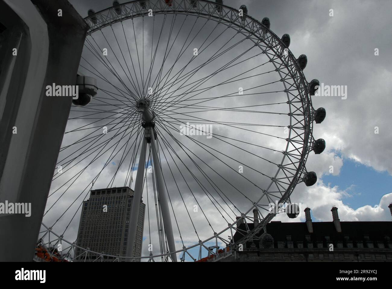 A photo of the 'London Eye' on a dark cloudy day in London, England, UK.. Stock Photo