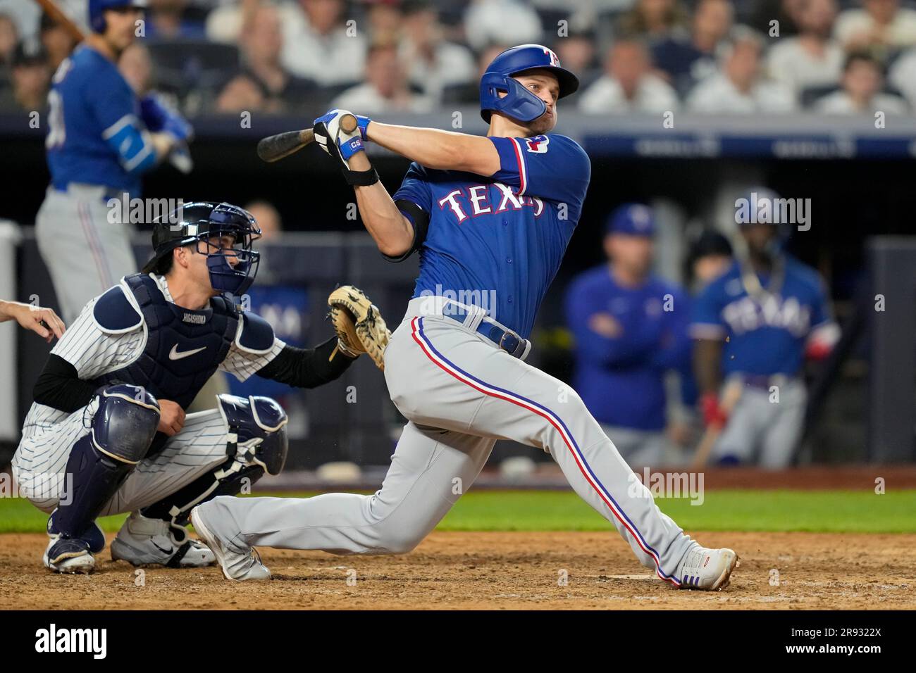Texas Rangers' Corey Seager hits a double in the ninth inning of a
