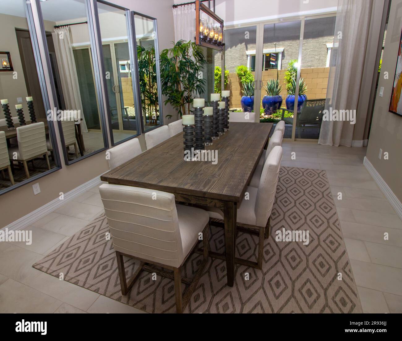 Formal Dining Room With Mirrors Stock Photo
