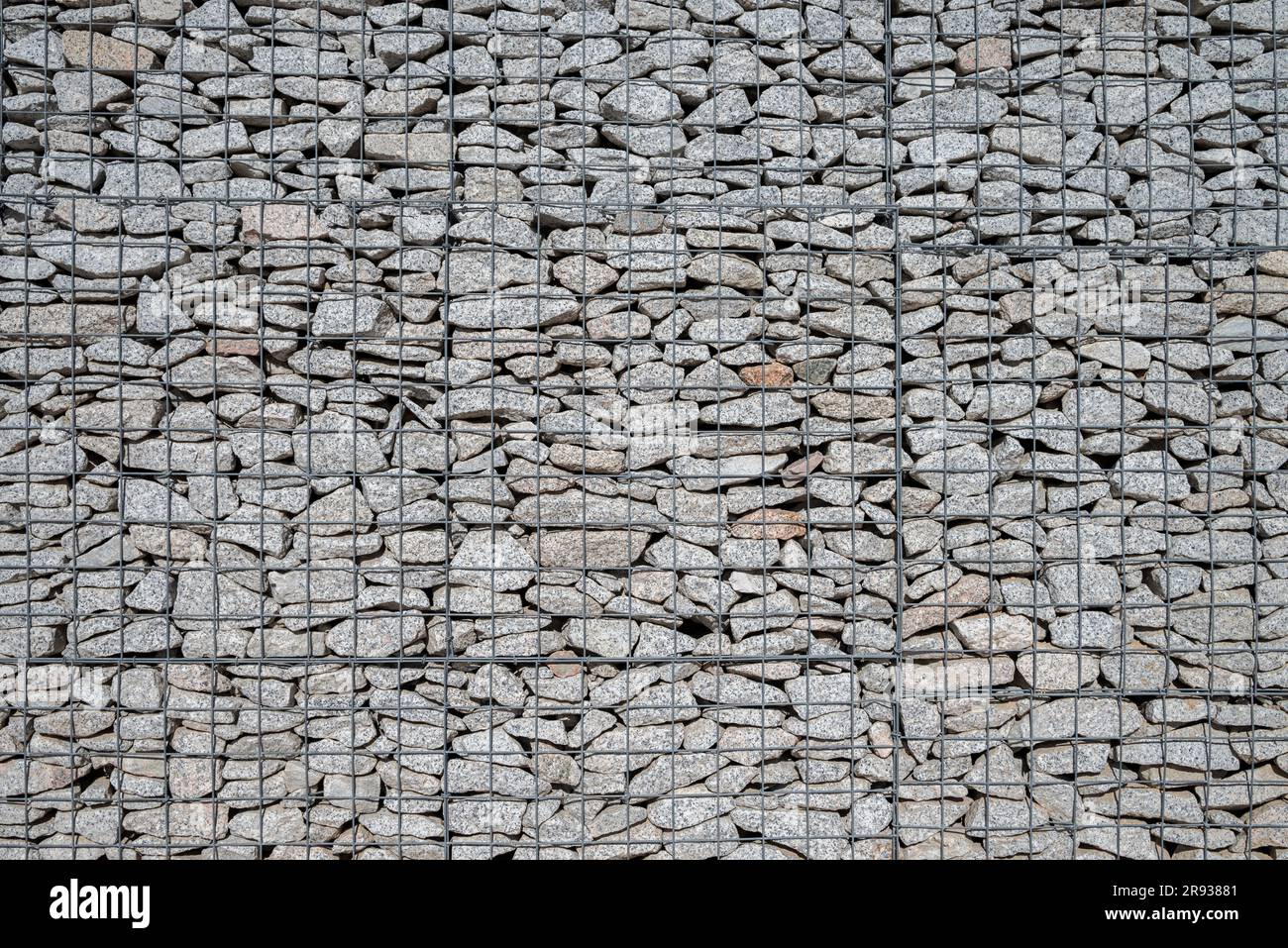 Gabion filled with granite stones Stock Photo Alamy