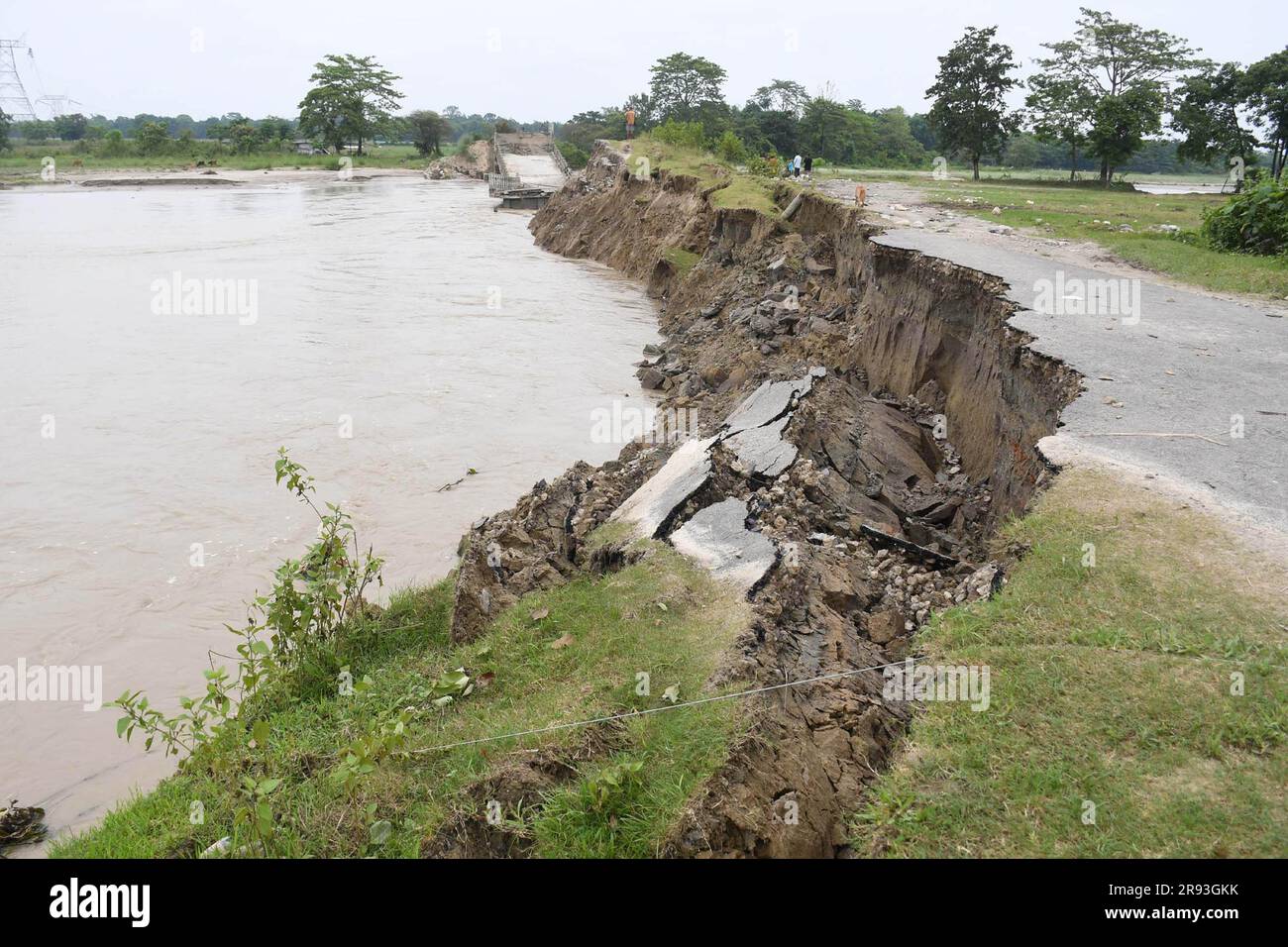 Baksa. 23rd June, 2023. A damaged road is seen after a flash flood ...