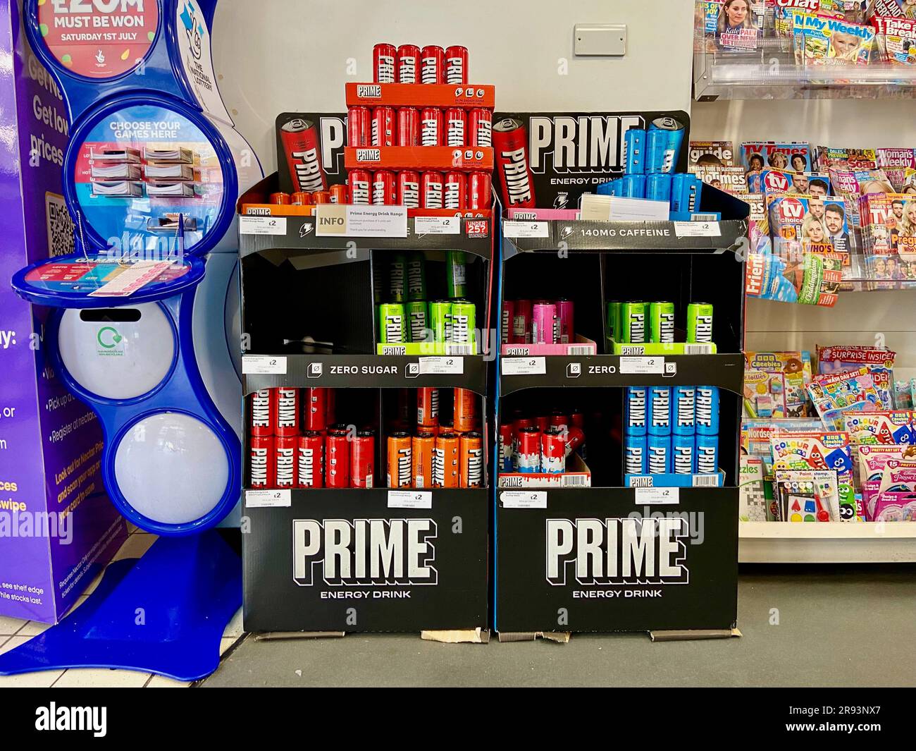 a lottery ticket dispenser and prime energy drink display in sainsburys