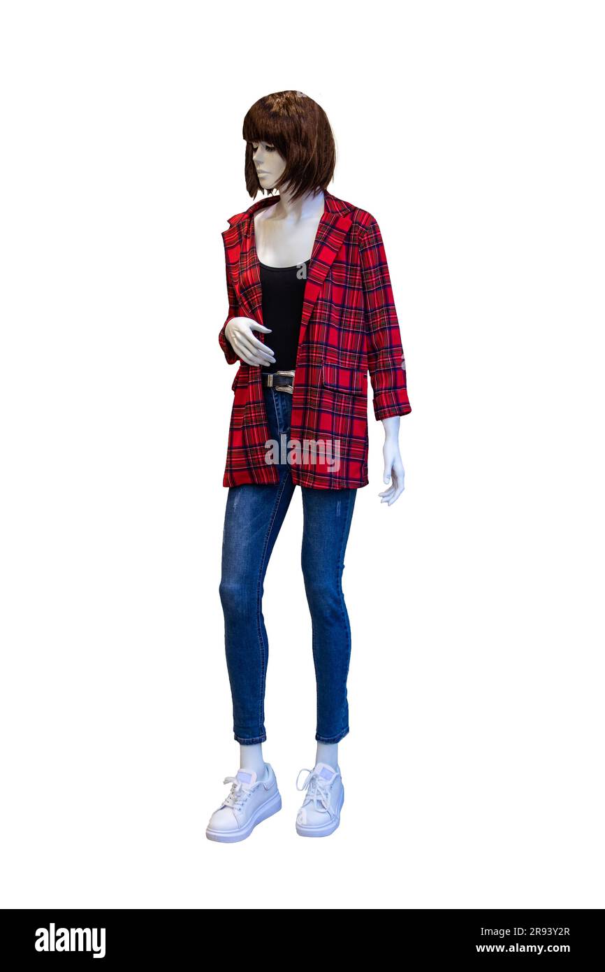 Female full length mannequin wearing a denim jeans, a red checked jacket, a black shirt and white sneaker isolated on white background. Woman with cas Stock Photo