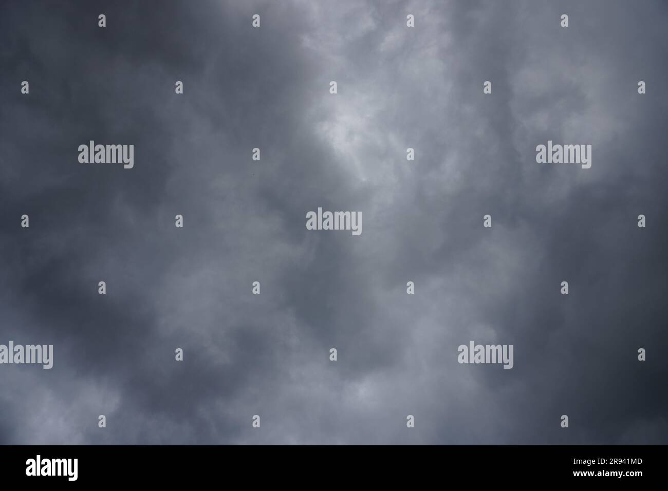 Dark storm clouds background Stock Photo - Alamy