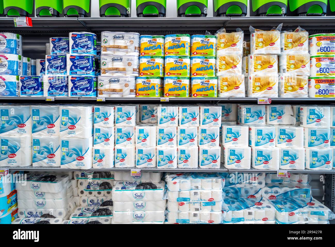 Italy June 22, 2023 Packs of toilet paper and hand paper towel roll