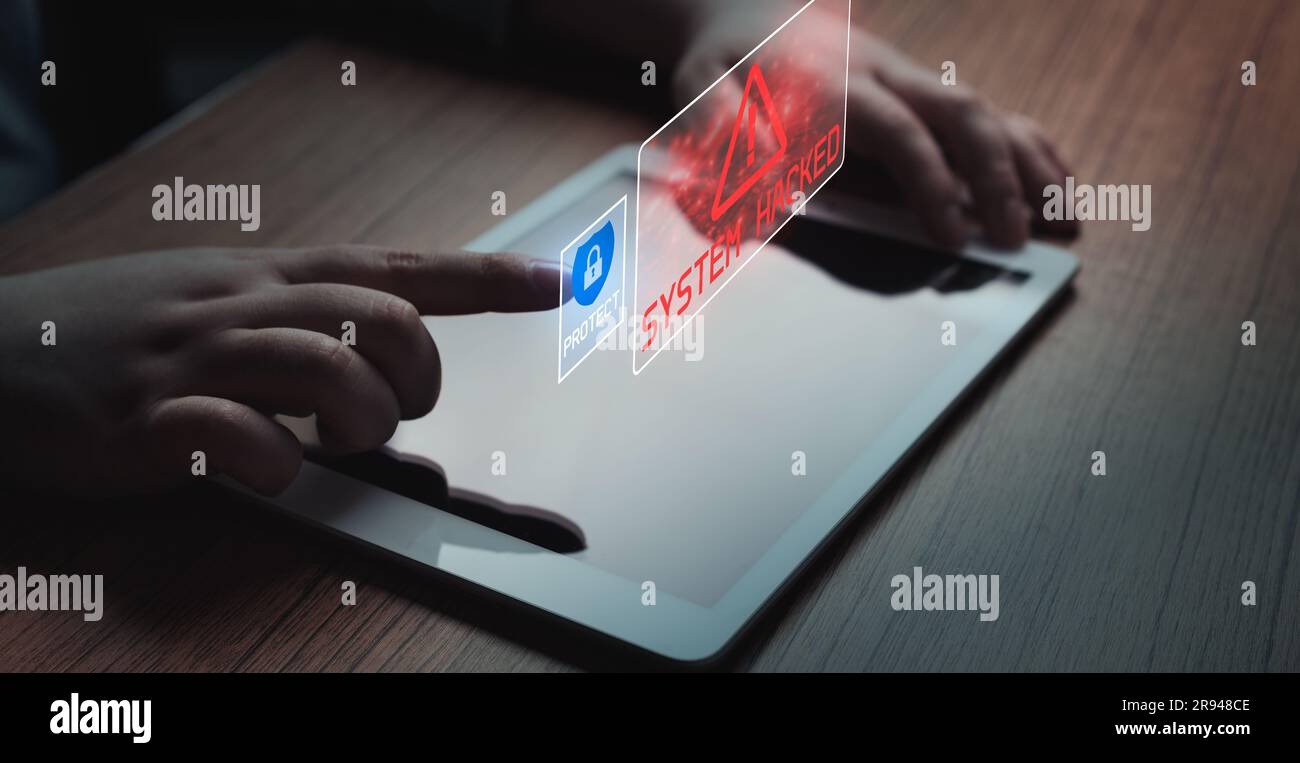 Woman use digital tablet to protect devices from system hacked alert. Compromised information concept. Internet virus cyber security and cybercrime. Stock Photo