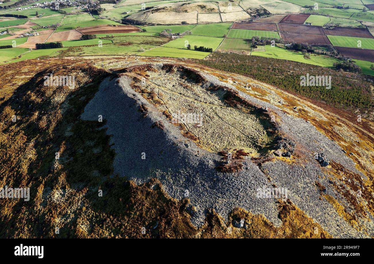 Tap o’ Noth prehistoric hillfort Grampian, Scotland. Massive vitrified wall of Neolithic core. Outer rampart encloses large early Medieval settlement Stock Photo