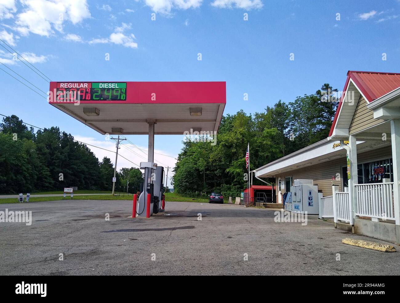 Current fuel prices for diesel and regular unleaded gasoline are displayed on a gas station awning amid an empty parking lot on Wednesday, June 24, 2020 at the Speedy Mart convenience store in Falls of Rough, Grayson County, KY, USA. The rate at which gas prices are increasing across the country is slowing, according to a report released by the American Automobile Association, with the national average cost of a gallon of unleaded gasoline increasing by three cents to $2.13 for the week ended June 22, 2020. (Apex MediaWire Photo by Billy Suratt) Stock Photo