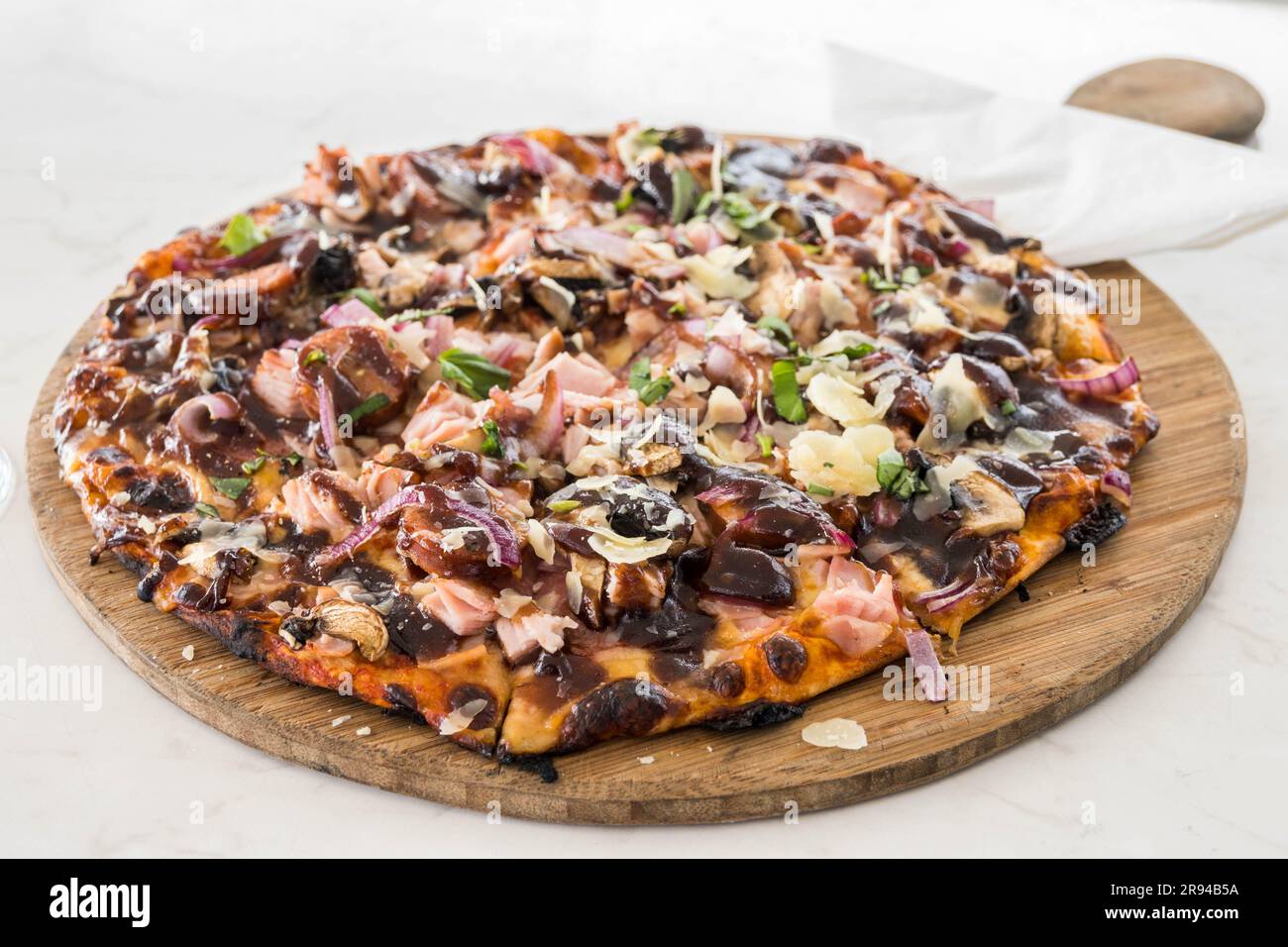 Meat Lovers Pizza with Pepperoni, Ham, Chorizo, Mushroom and BBQ Sauce Stock Photo Alamy