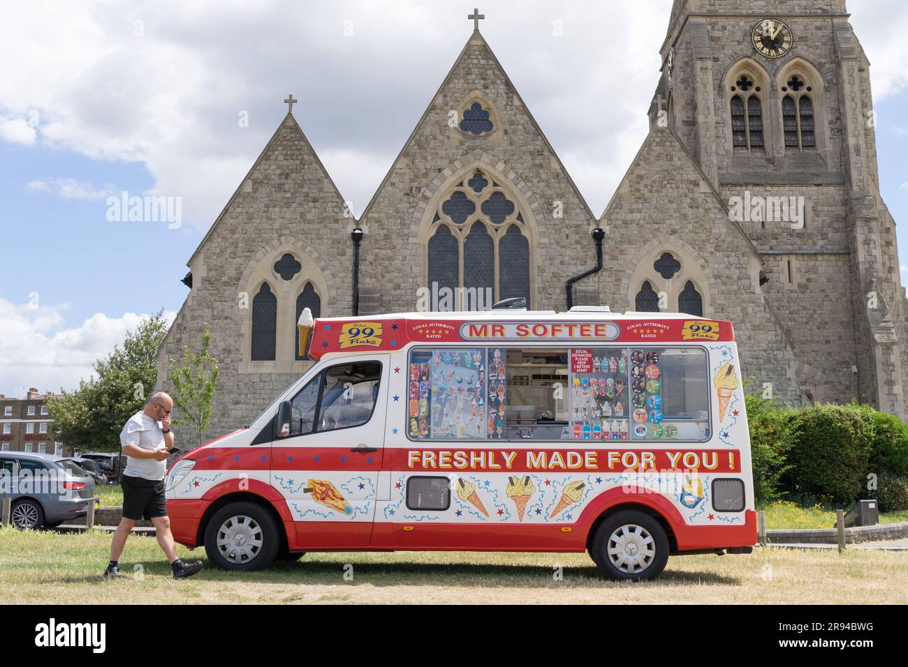 London UK, 24th June 2023. a man walked toward to Ice cream van selling