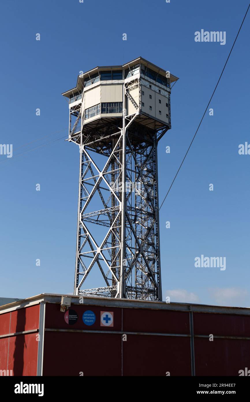 Barcelona, Spain - FEB 10, 2022: Torre Sant Sebastia is a 78 metre tall free standing lattice tower in Barcelona, Catalonia, Spain which is used as a Stock Photo